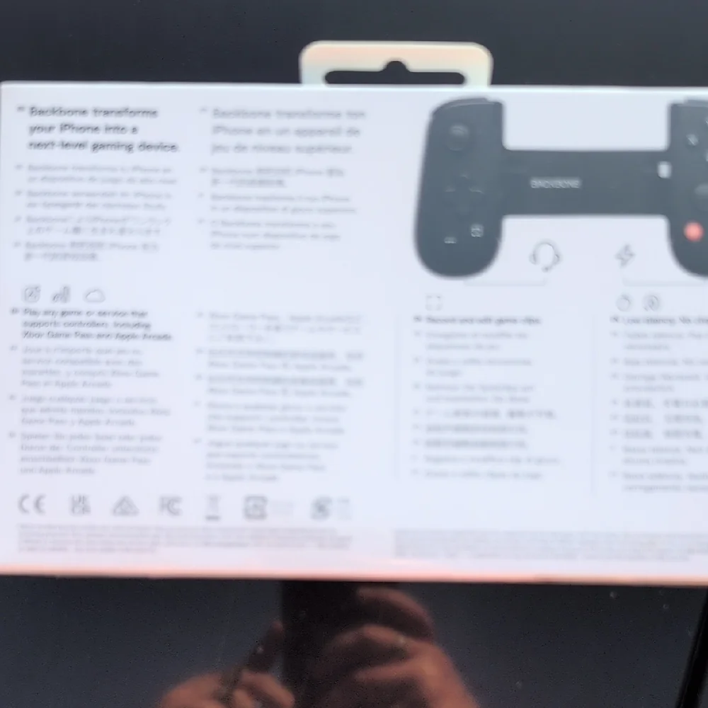 Black Handheld Gaming Console with Mobile Integration